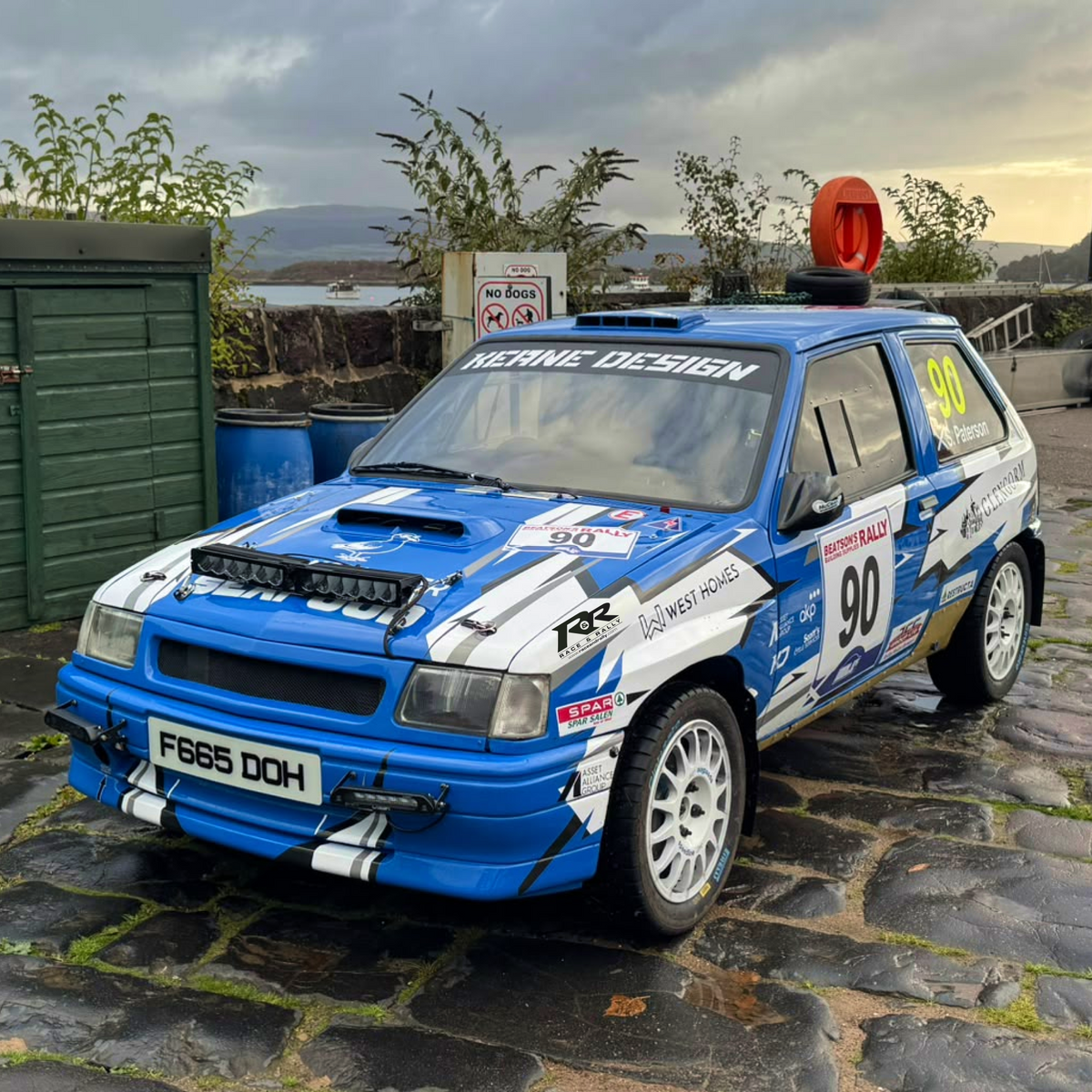 Lazer Lamps Universal Rally Kit with two carbon fiber bonnet pod lamps, mounted on a vehicle for rally racing.