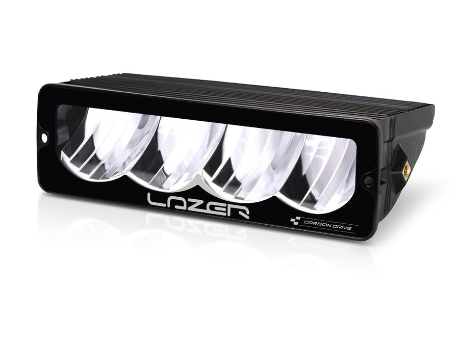 Lazer Lamps Carbon-4 Drive Carbon Series LED off-road driving light with angled side fix, mounted on vehicle.