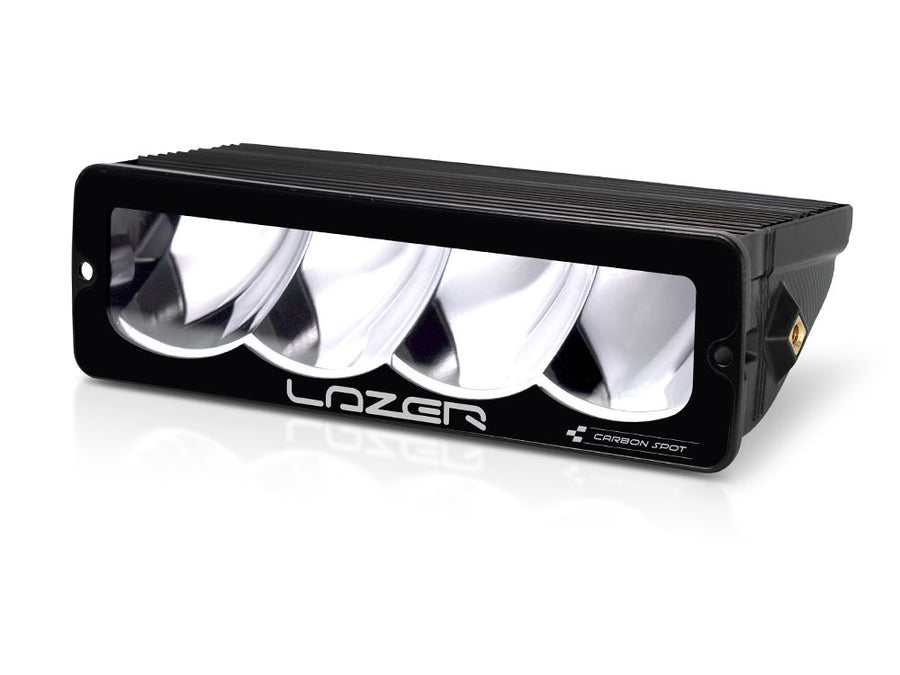 Lazer Lamps Carbon-4 Spot from Carbon Series, angled side view showing sleek black housing and mounting bracket.