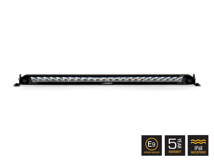 Linear-24 Elite Lazer Lamps linear LED work light with side mounts, shown head-on with web icons in the image.